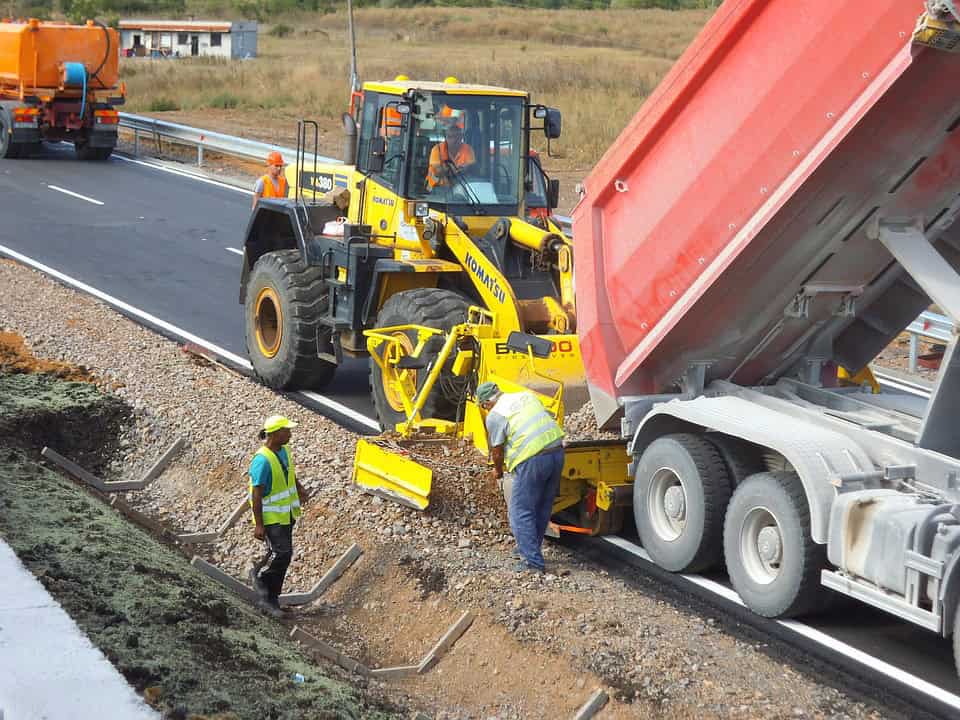 Professional grading services using laser-guided technology for precise site leveling and land contouring.